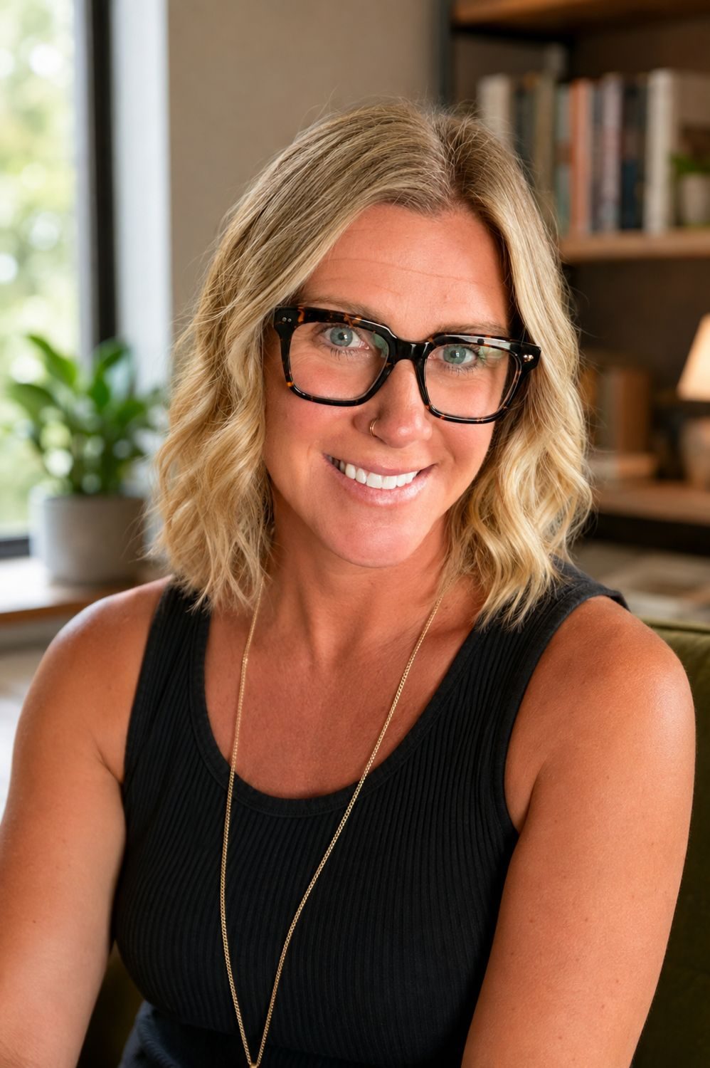 Stephanie Garrison, smiling, in her office